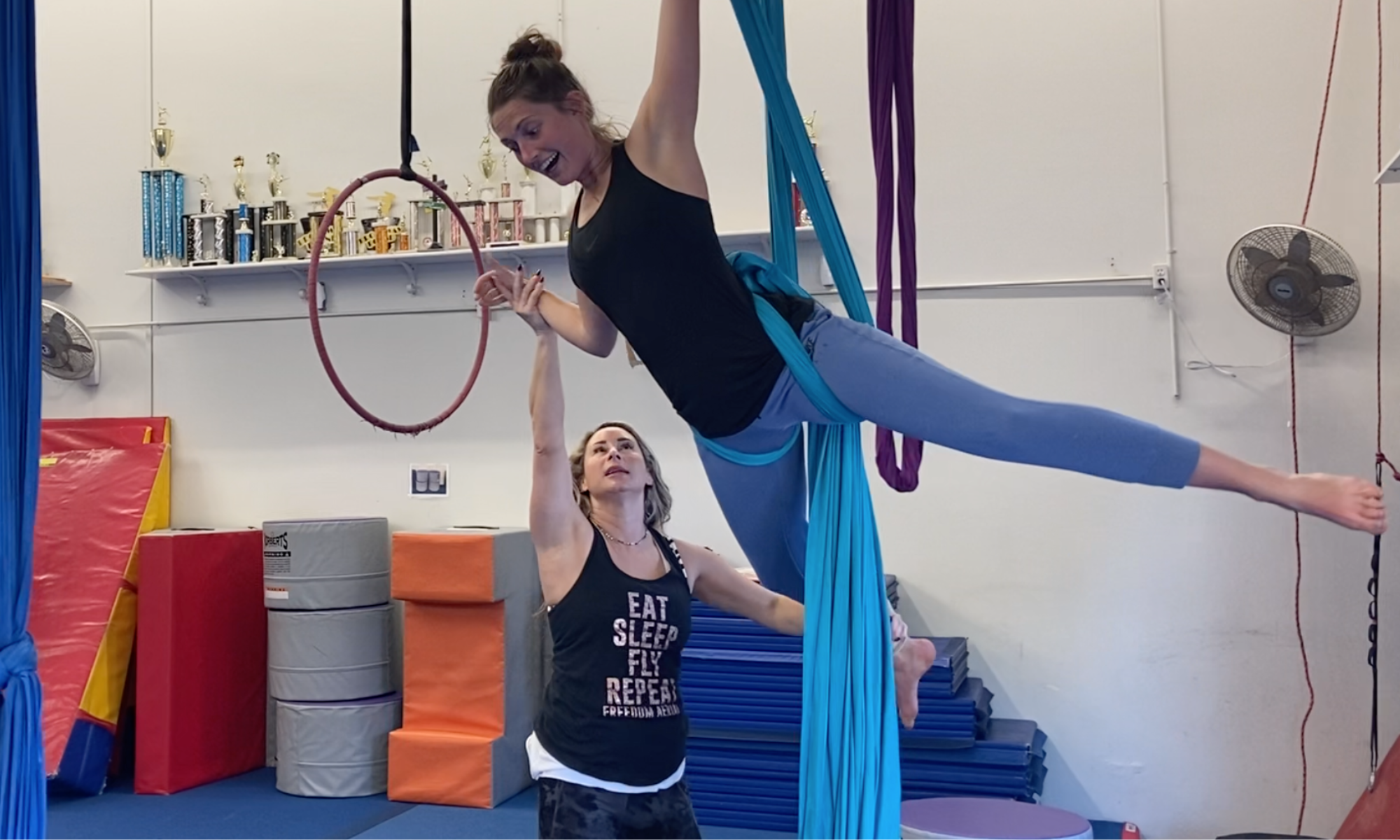 Freedom Aerial's owner, Lucy, Coaching in her Aerial Arts Beginner Silk Class San Clemente California Things to Do Near Me Aerial Arts Classes